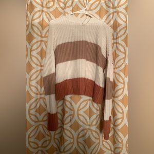 I am selling this really pretty Moons and Madison cropped sweater in a size L